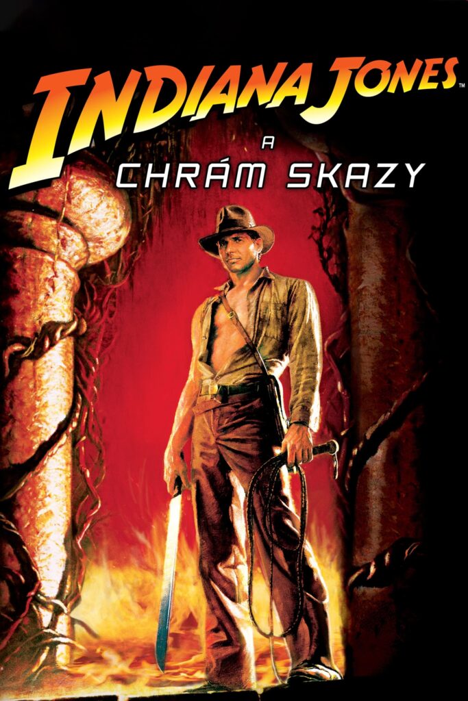 Indiana Jones stojí a jednej ruke má meč a v druhej bič